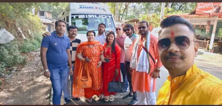 Devotees adorned with saffron tilak and traditional angavastram celebrating Brij Yatra