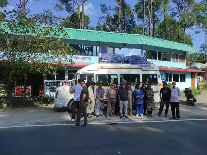 Tour travelers relaxing at clean mountain highway dhaba and resort facility