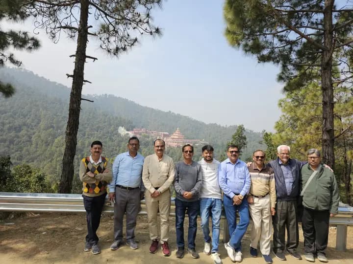 Gentlemen travelers looking out towards the majestic misty Himalayan ranges